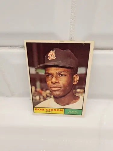 Vintage Bob Gibson baseball trading card from 1961 Topps #211 in EX-NM condition