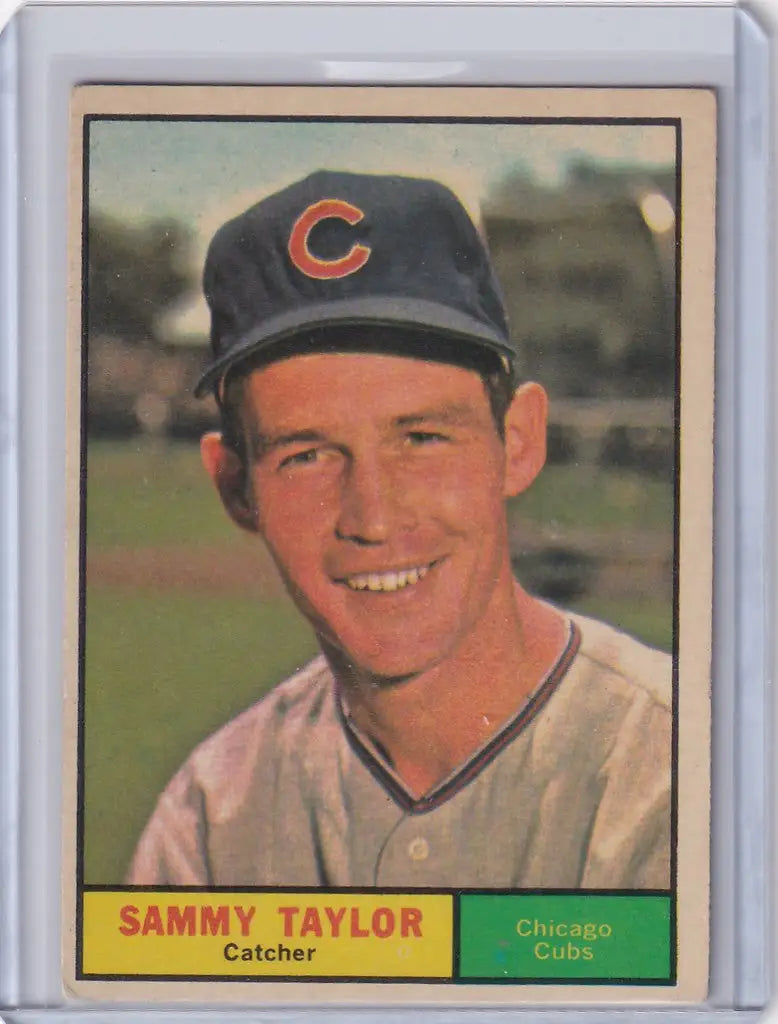 Baseball card of Sammy Taylor in Chicago Cubs cap and uniform from 1961 Topps
