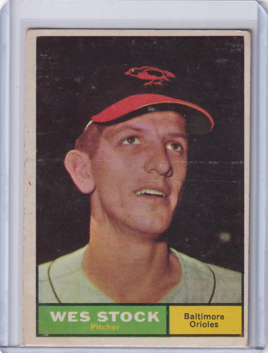 1961 Topps Wes Stock baseball card featuring Baltimore Orioles pitcher in red cap
