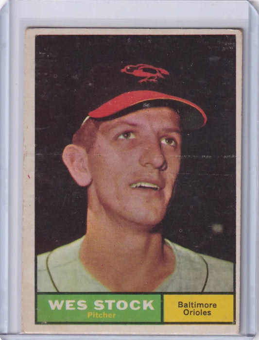 1961 Topps Wes Stock baseball card featuring Baltimore Orioles pitcher in red cap