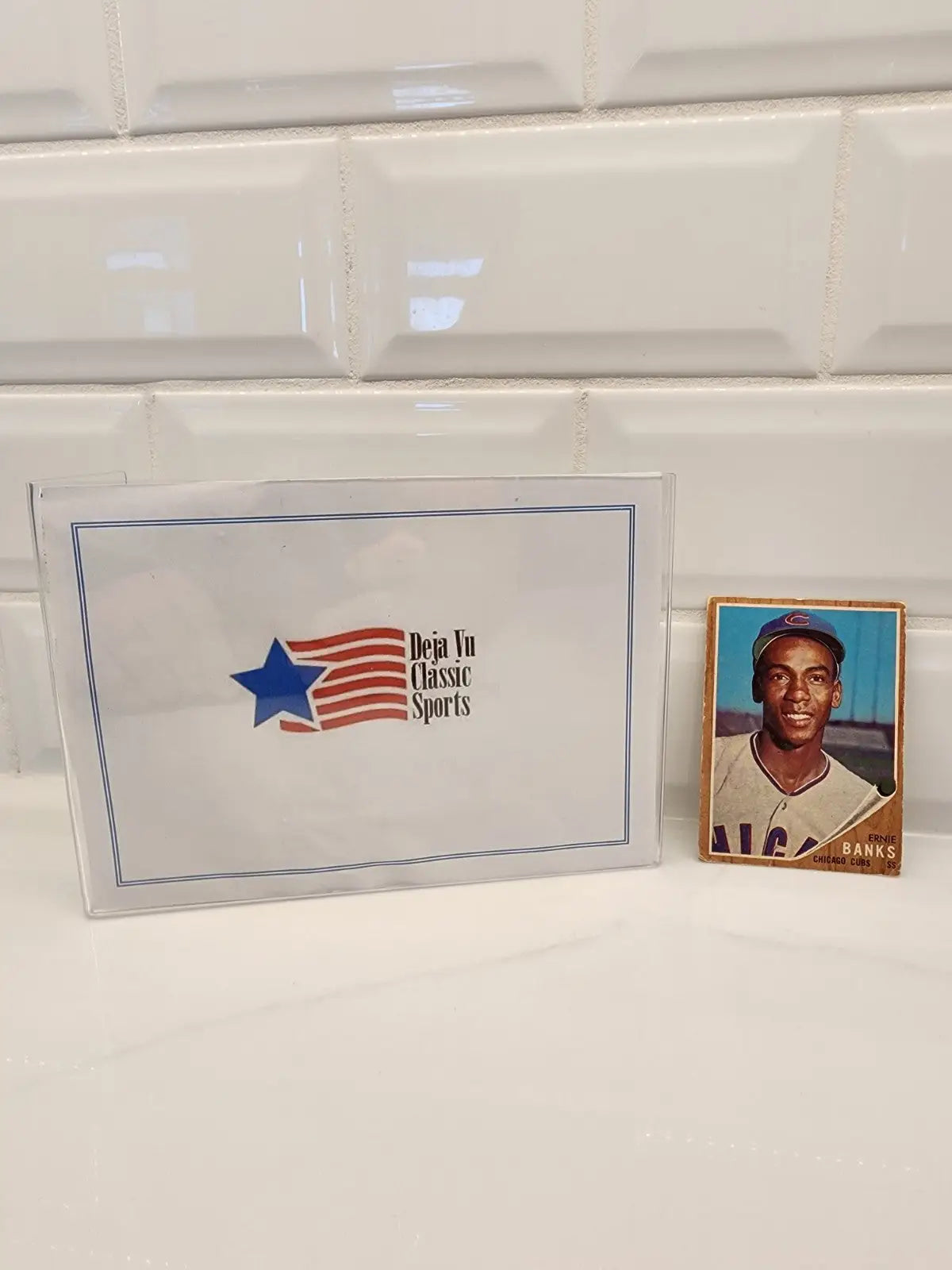 Ernie Banks Topps trading card displayed in a Deja Vu Classic Sports box