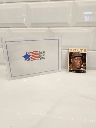 Sports trading card of Jimmy Wynn in protective case for 1964 Topps collection