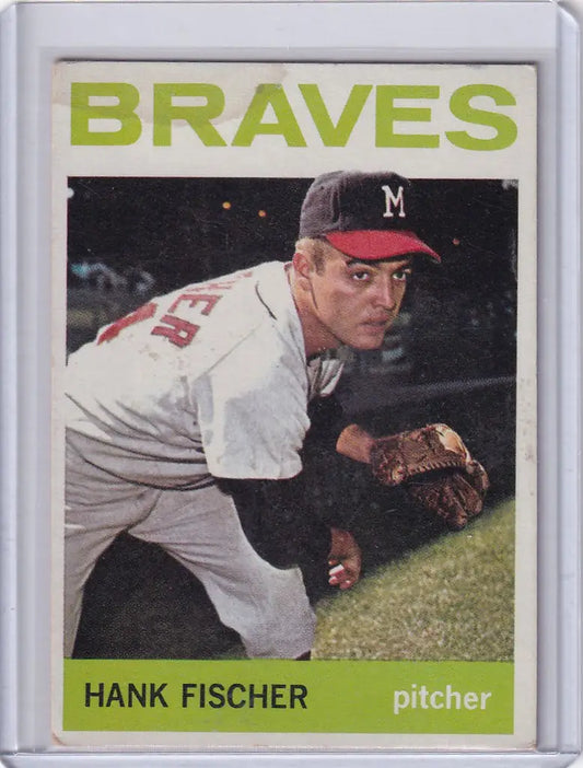 Baseball card of Hank Fischer pitching for the Milwaukee Braves Topps Baseball 1964