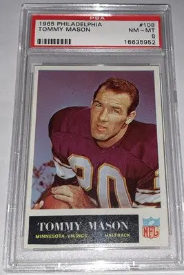 Graded 1965 Philadelphia Football Tommy Mason card displayed in Vikings collectible product
