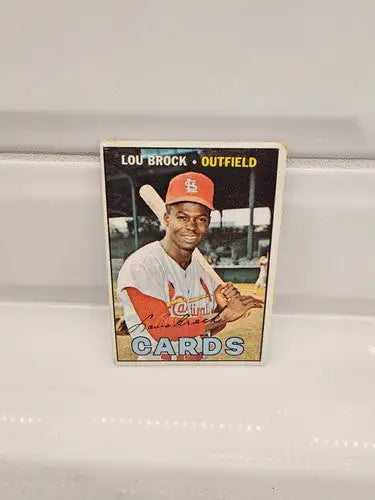 Lou Brock baseball trading card from 1967 Topps #285 with classic trading card features