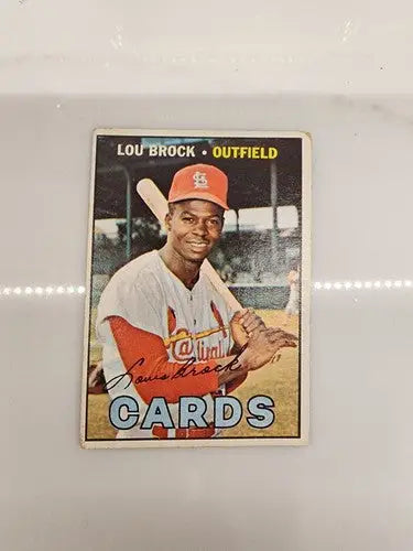 Vintage Lou Brock baseball card from 1967 Topps #285 with authentic trading card features