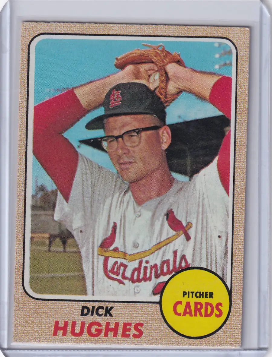 Baseball card of Dick Hughes in wind-up pose for Topps Baseball, St. Louis Cardinals
