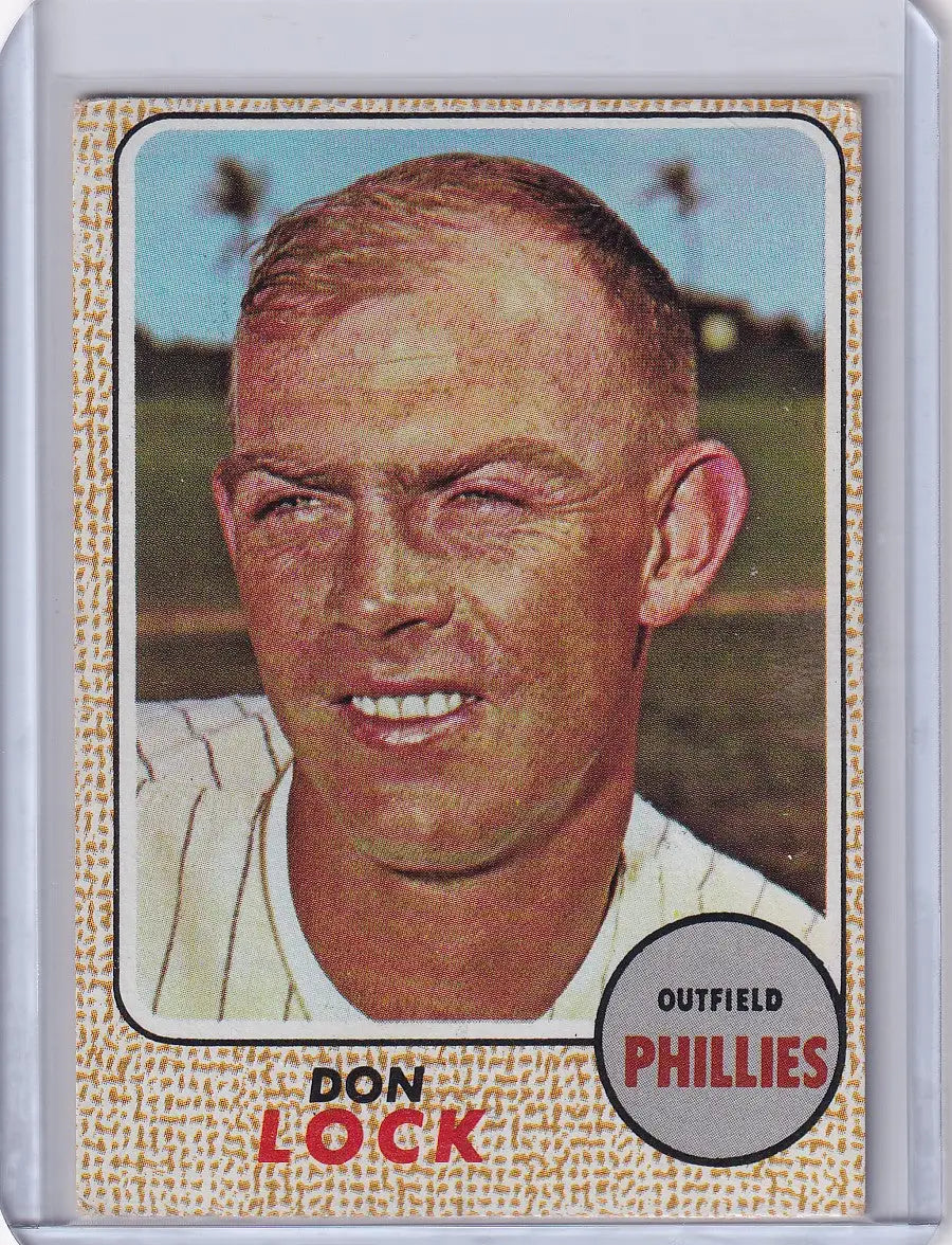 Vintage Topps Baseball card of Don Lock smiling for the Philadelphia Phillies