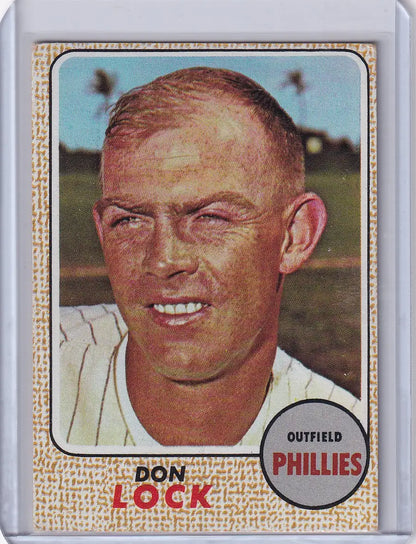 Vintage Topps Baseball card of Don Lock smiling for the Philadelphia Phillies