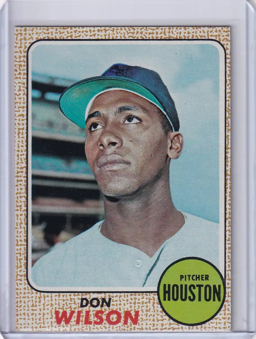 1968 Topps Baseball card of Don Wilson from the Houston Astros with green brim cap