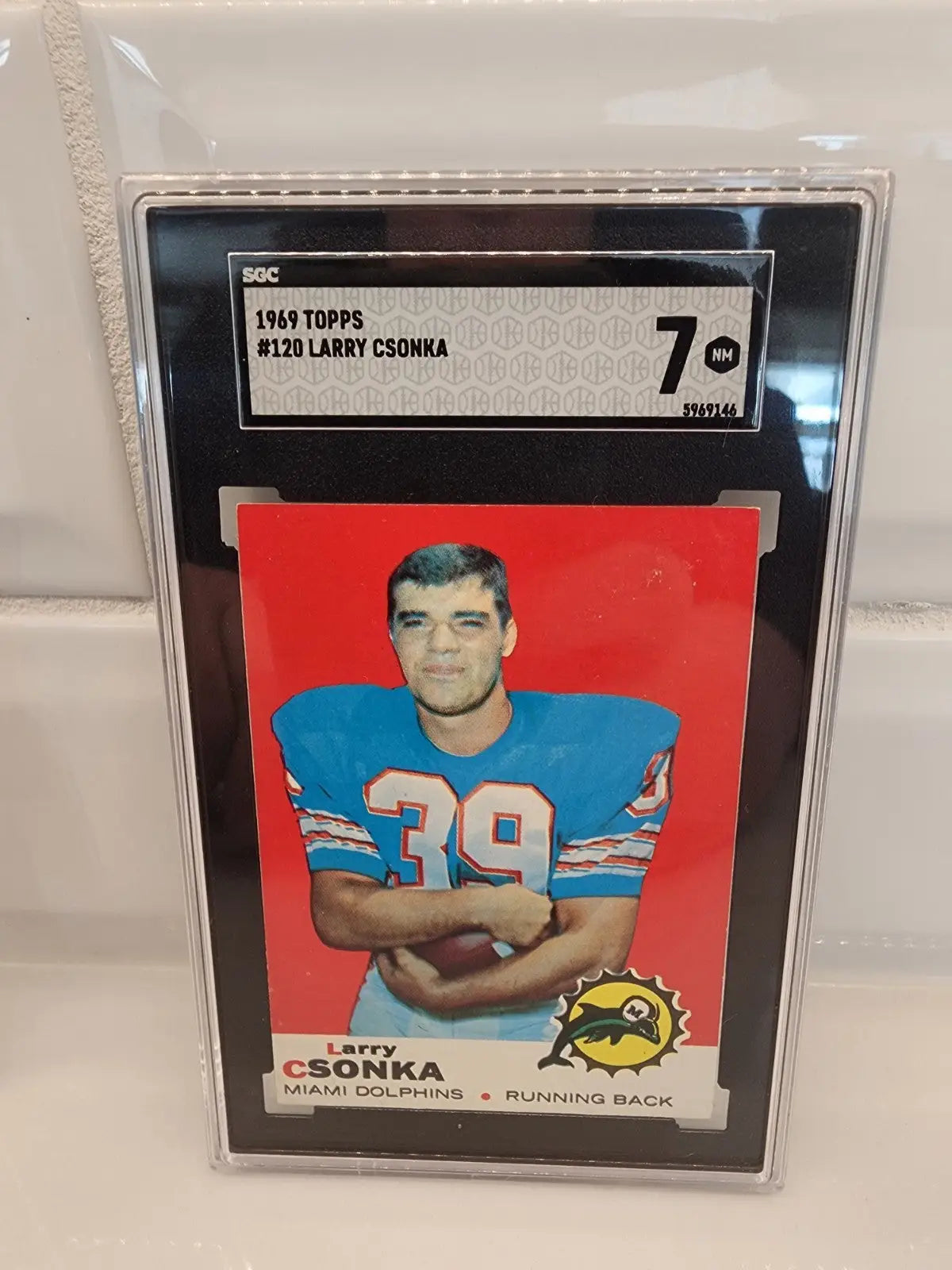 Graded 1969 Topps Larry Csonka football trading card Csonka RC SGC 7