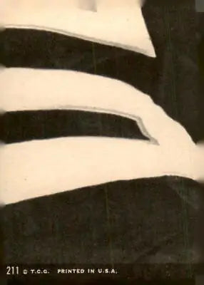 Black and white striped object on 1969 Topps #211 Tom Sestak trading card