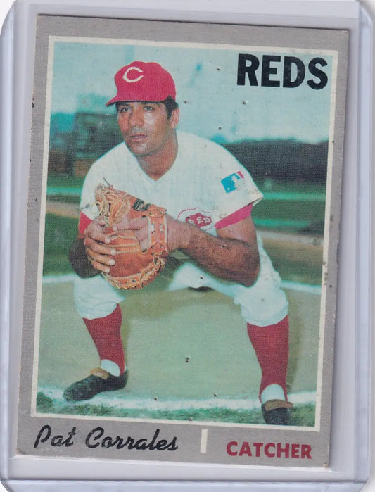 Vintage Topps Baseball card of Pat Corrales, Cincinnati Reds catcher in red and white uniform