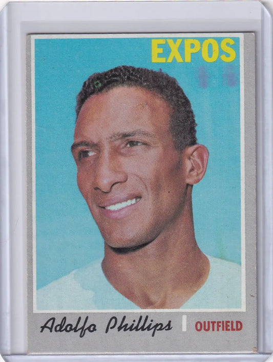 Baseball card of Adolfo Phillips, smiling outfielder for Montreal Expos by Topps Baseball