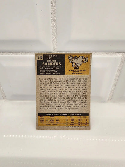 Vintage trading card of Charlie Sanders from 1971 Topps featuring EX-NM condition