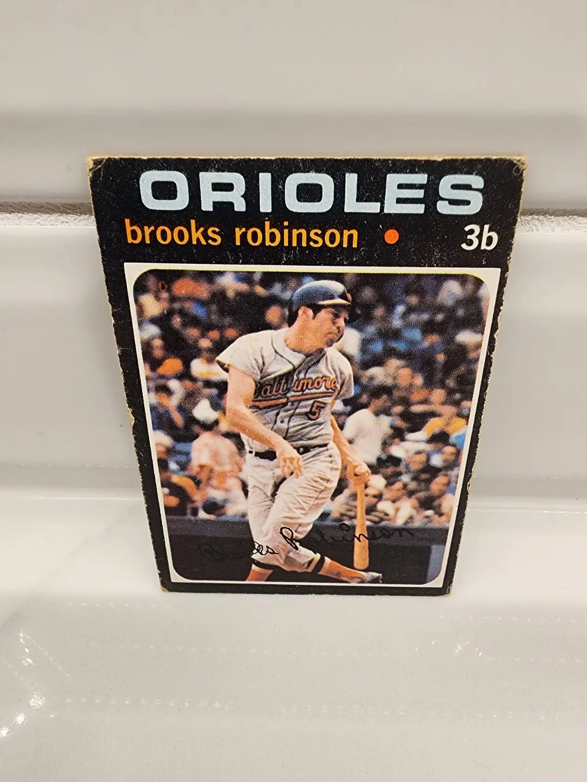 Trading card featuring Brooks Robinson from 1971 Topps #300 showcasing a Topp Brooks Robinson collectible
