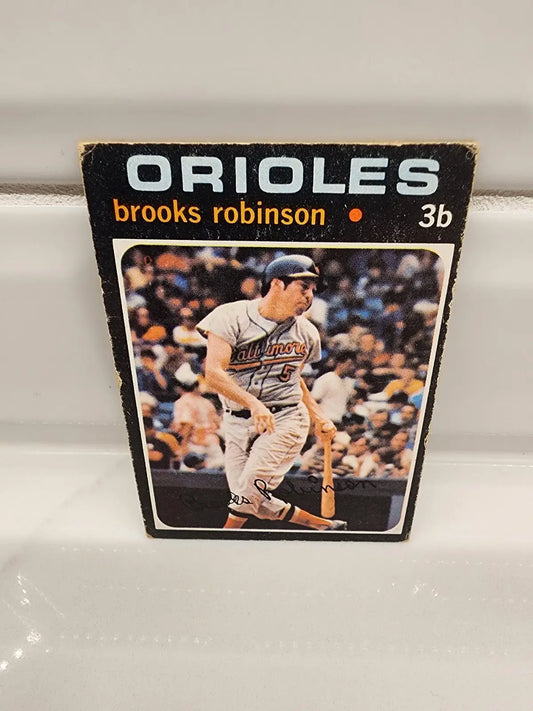 Trading card featuring Brooks Robinson from 1971 Topps #300 showcasing a Topp Brooks Robinson collectible
