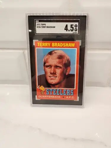 Graded Terry Bradshaw football trading card from 1971 Topps sports trading card collection