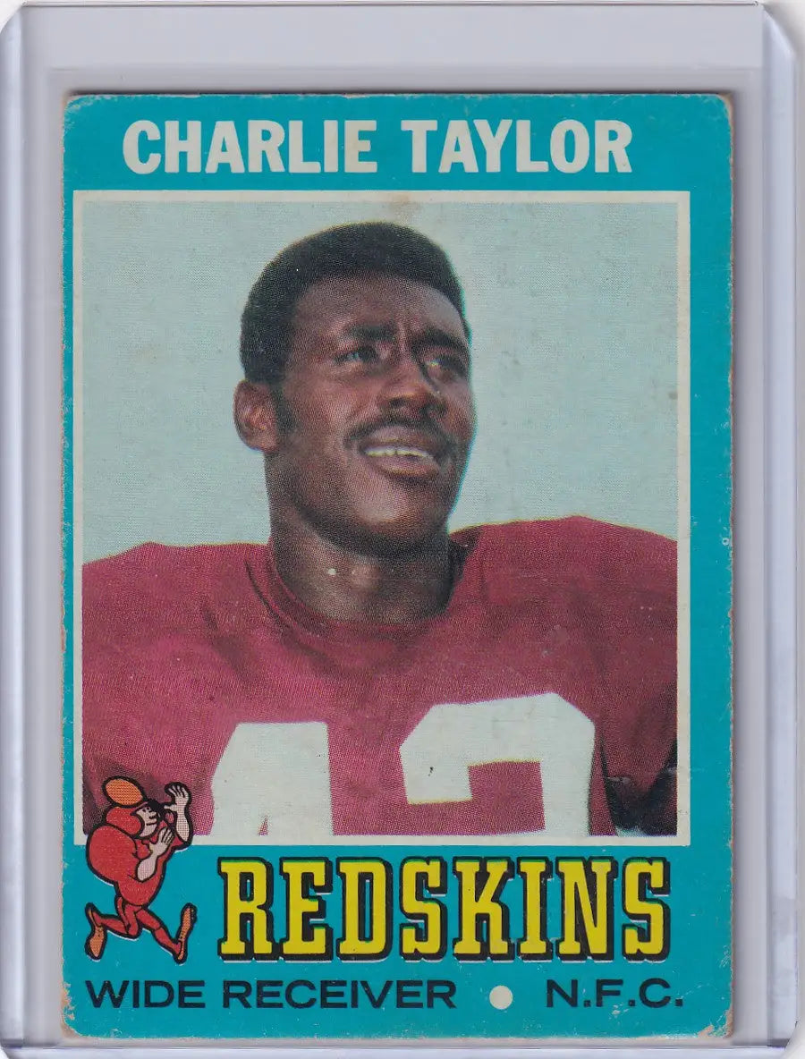 Vintage Topps Football card of Charley Taylor in red jersey for Washington Redskins