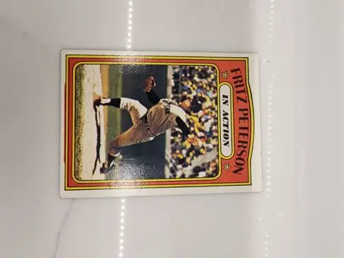 Fritz Peterson baseball trading card from 1972 Topps In Action series for card enthusiasts
