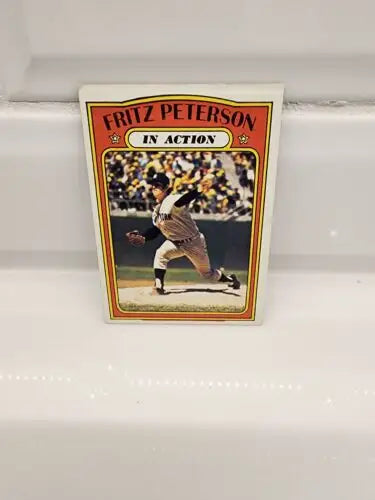 Fritz Peterson baseball trading card from 1972 Topps In Action series for card enthusiasts