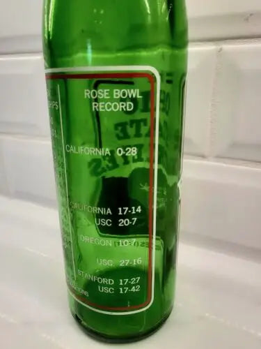 Green glass bottle featuring Rose Bowl label honoring Ohio State Buckeyes Ntl Champs