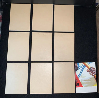 Baseball card collection featuring 1973 Topps Wacky Packages Stickers Series 3 with tan backs