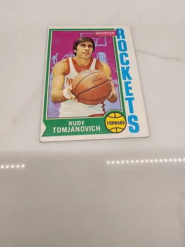Rudy Tomjanovich trading card from 1974-75 Topps series featuring Rudy Tomjanovich basketball player