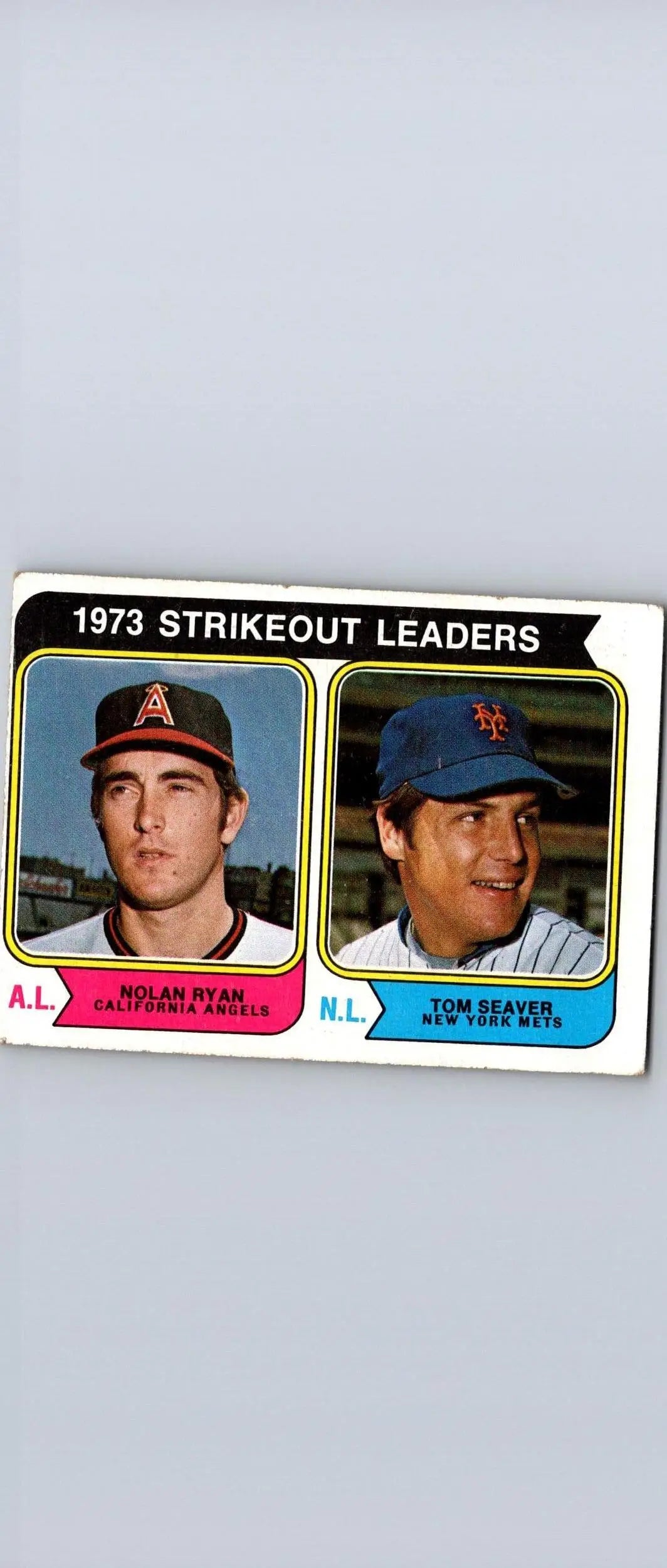 1974 Topps #207 1973 Strikeout Leaders baseball card featuring Nolan Ryan and Tom Seaver