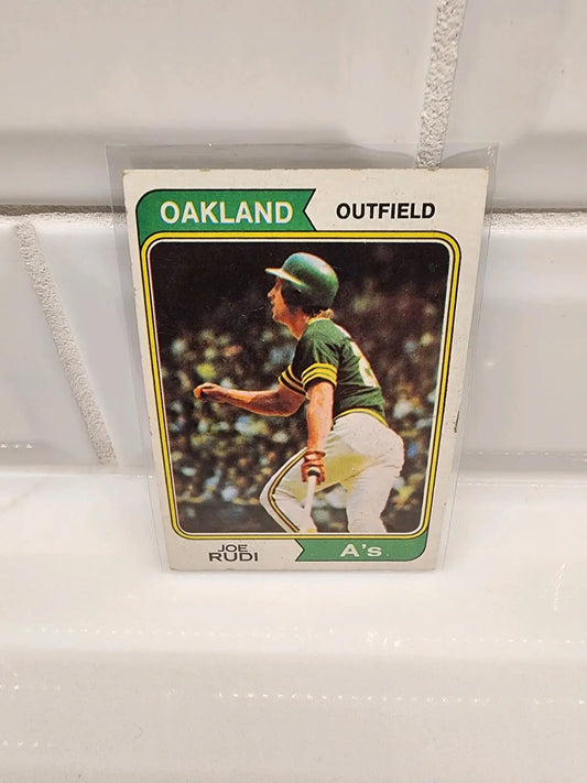 Joe Rudi Oakland A’s baseball card from 1974 Topps sports trading cards collection