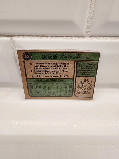 1974 Topps Bobby Murcer trading card featuring York Yankees player on display