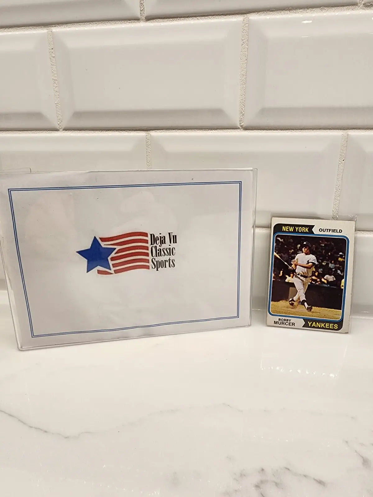 Baseball trading card of Bobby Murcer in protective sleeve from 1974 Topps York Yankees