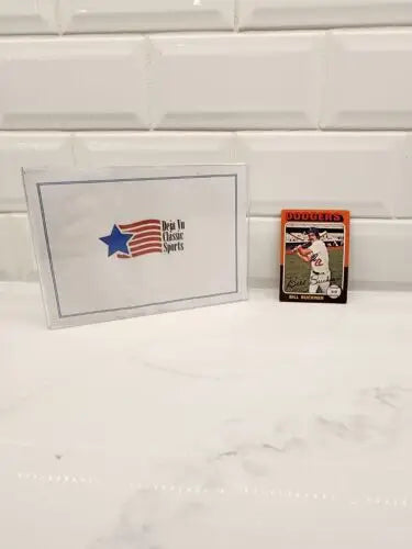 Sports trading card featuring 1975 Topps Bill Buckner #244 in protective case