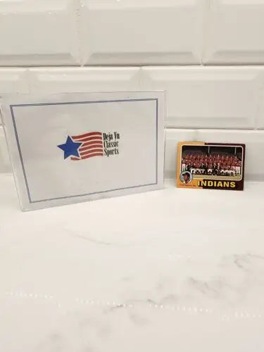 1975 Topps Team Checklist #331 Frank Robinson trading card in a sports memorabilia display