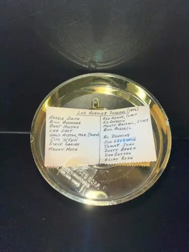 Gold dish with names, featuring Steve Garvey in Dodgers history trading cards collection