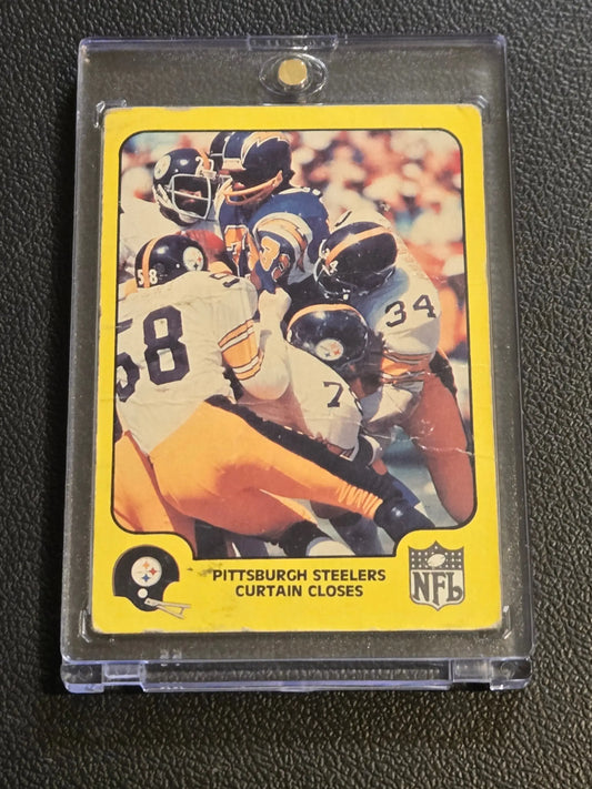 Vintage Pittsburgh Steelers football card in protective case from 1978 Fleer Team Action Curtain Closes