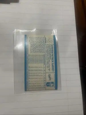 Vintage Baseball Card in Protective Sleeve featuring 1980 Kellogg’s Steve Garvey