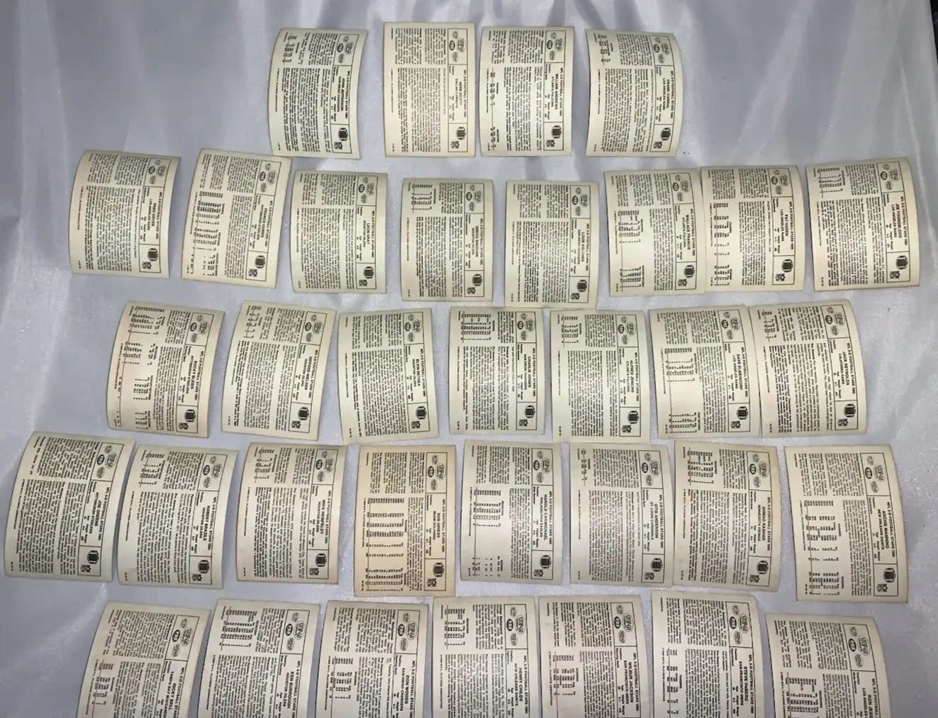 Collection of 35 light-colored nfl football stars partial card set with icons