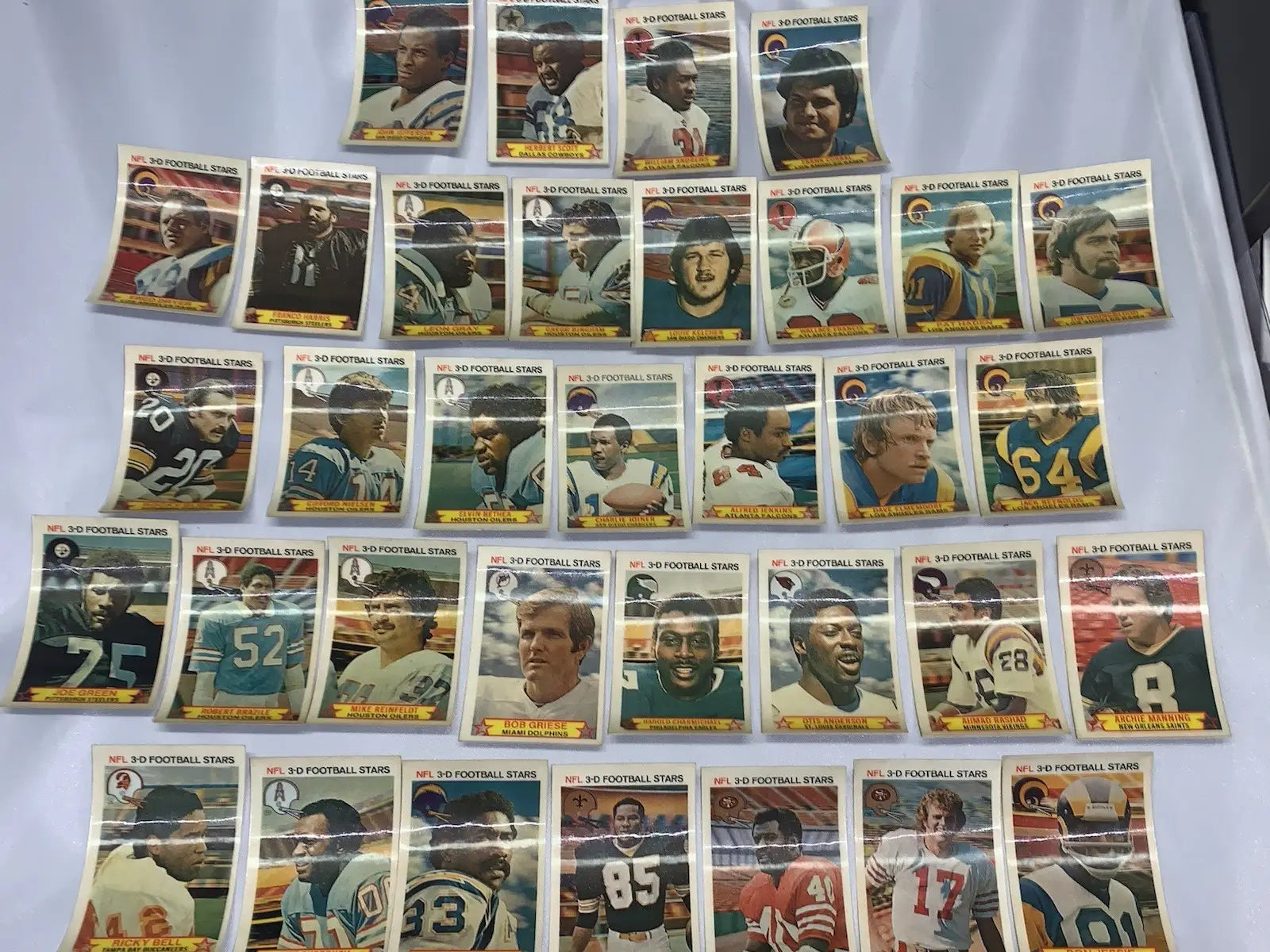 Vintage NFL football stars trading cards from the 1980 Stop N Go partial card set