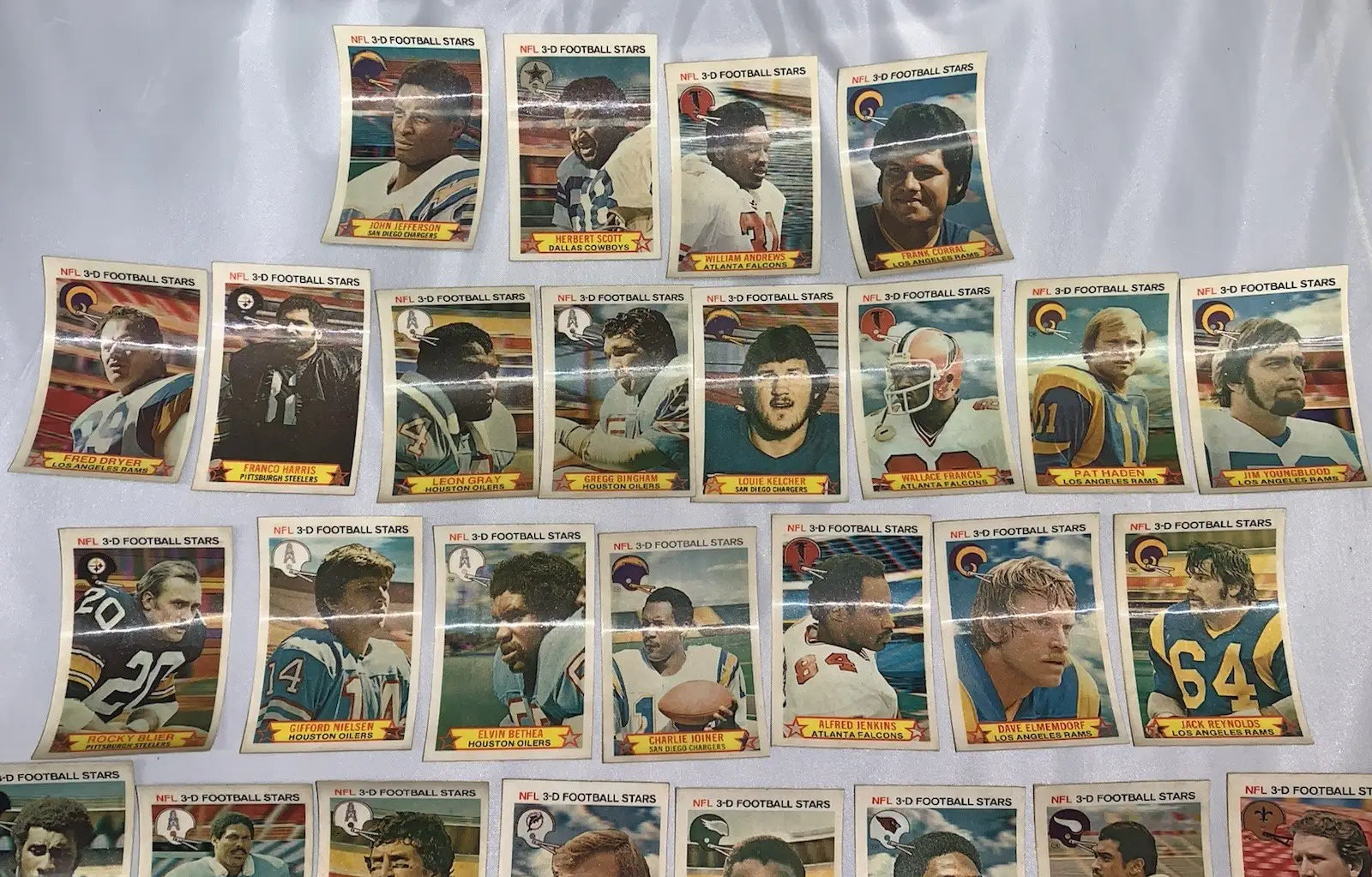 Vintage NFL football stars trading cards from incomplete 1980 Stop N Go 3-D NFL set