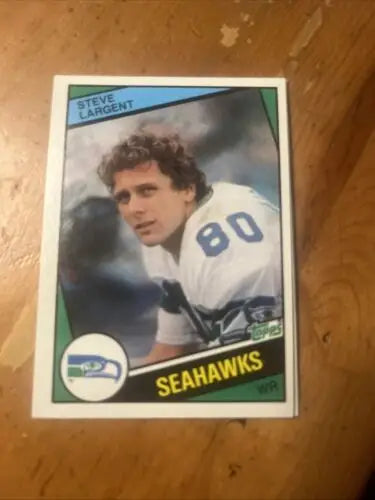 Steve Largent 1984 Topps trading card in NRMT-MINT condition for Seattle Seahawks fans