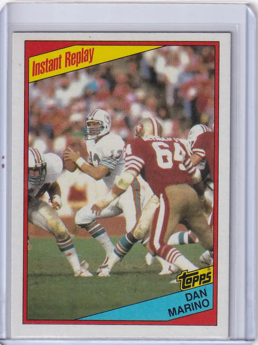 1984 Topps Football #124 Dan Marino card featuring Miami Dolphins legend