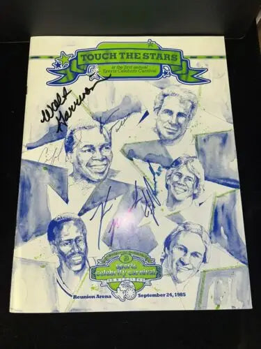 Signed Touch the Stars poster featuring Dallas Cowboys legends Tony Dorsett and Staubach
