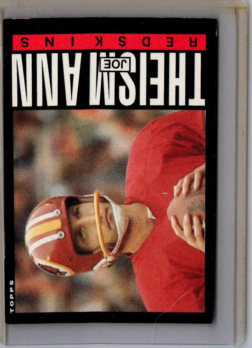 1985 Topps Joe Theismann football card displaying Joe Theismann memorabilia