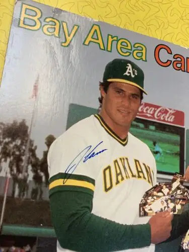 Autographed Oakland Athletics store display featuring Jose Canseco and Will Clark RC promo