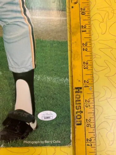 Baseball player’s lower body highlighted on 1986 Mothers Cookies store display trading cards