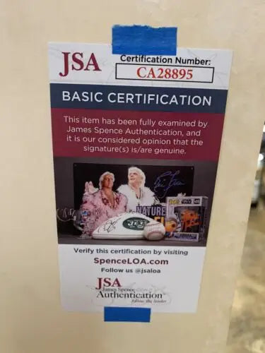 JSA authentication sticker on 1986 Mothers Cookies store display featuring Jose Canseco