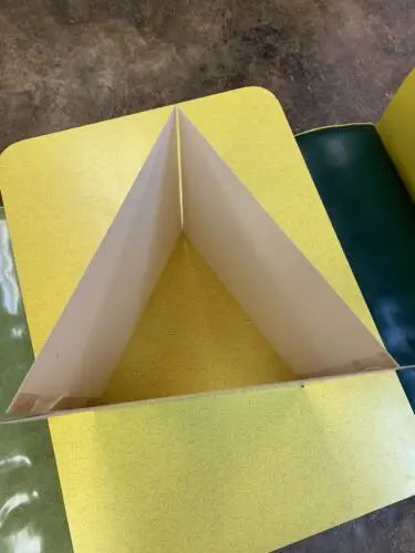 Yellow and green folding store display board featuring Jose Canseco trading cards