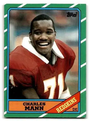Charles Mann football card from 1986 Topps #181b featuring the defensive star
