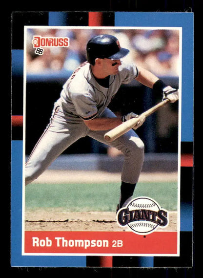Baseball card of Robby Thompson bunting from 1988 Donruss set for trading cards collection